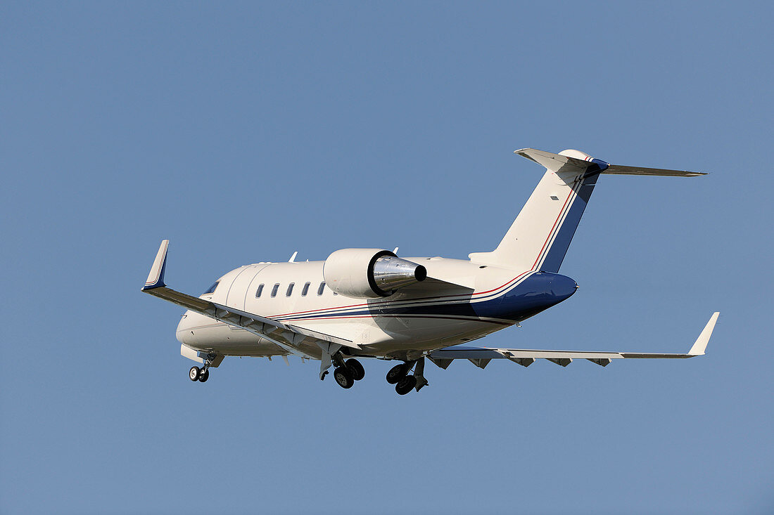 Bombardier Challenger 605 private jet taking off