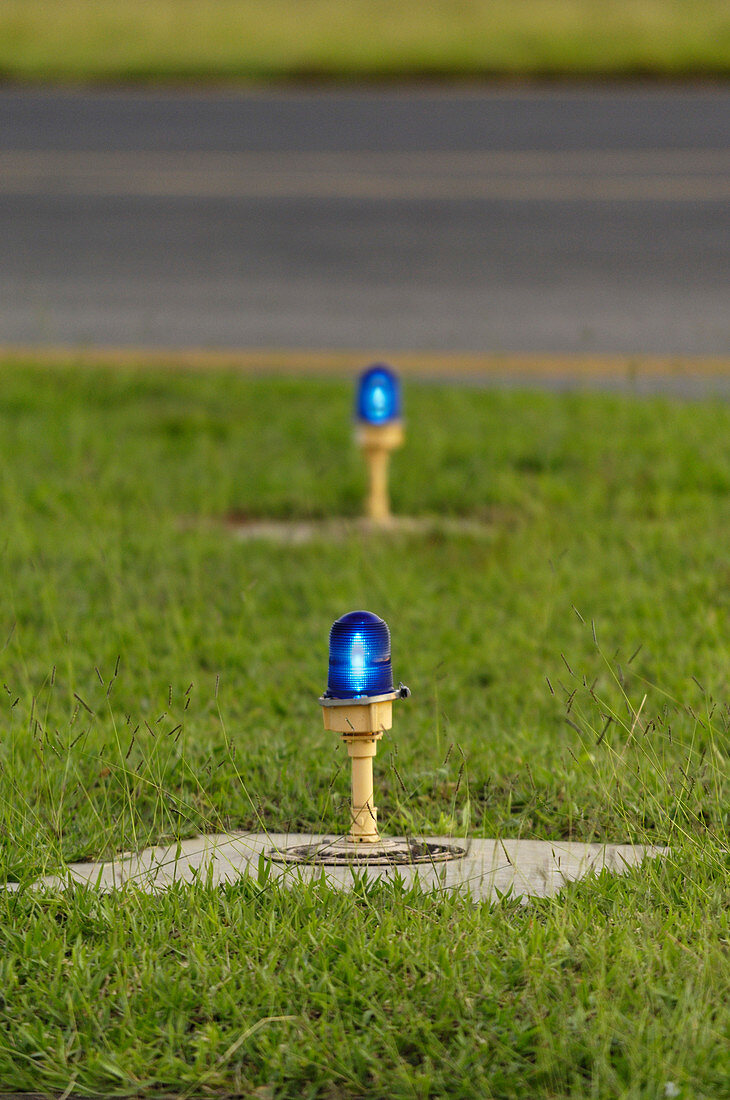 Blue airport taxiway lights