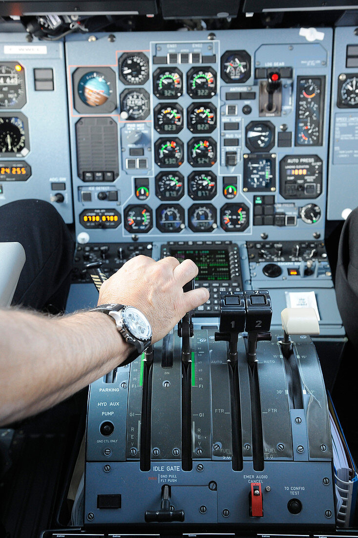 Pilot's hand on throttle