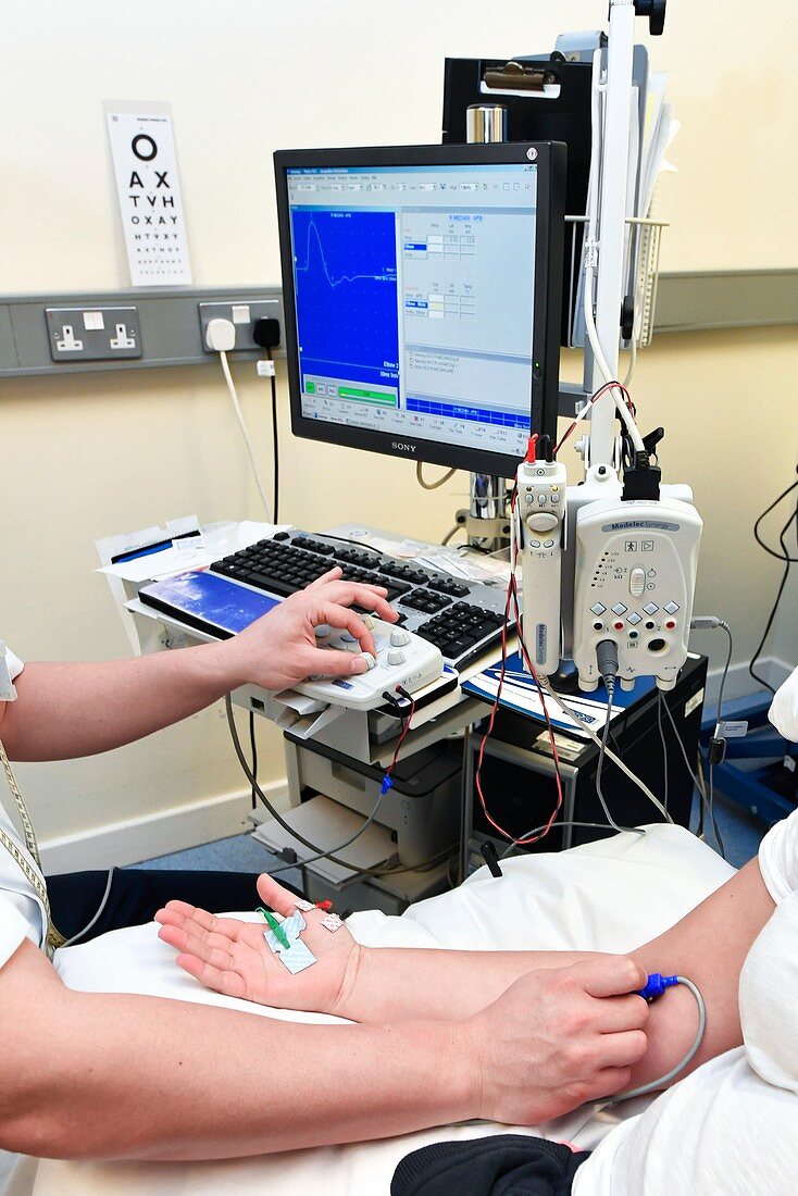 Nerve conduction test on wrist patient