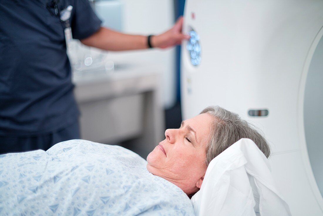 Female patient entering MRI scanner