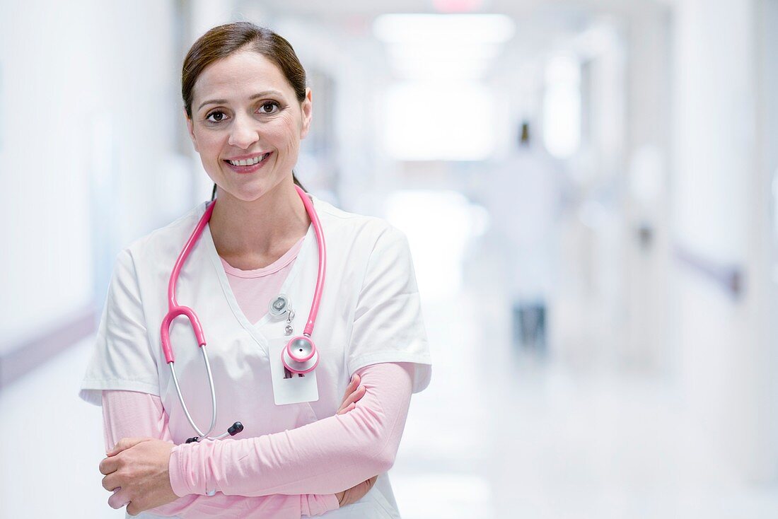Nurse smiling, arms folded