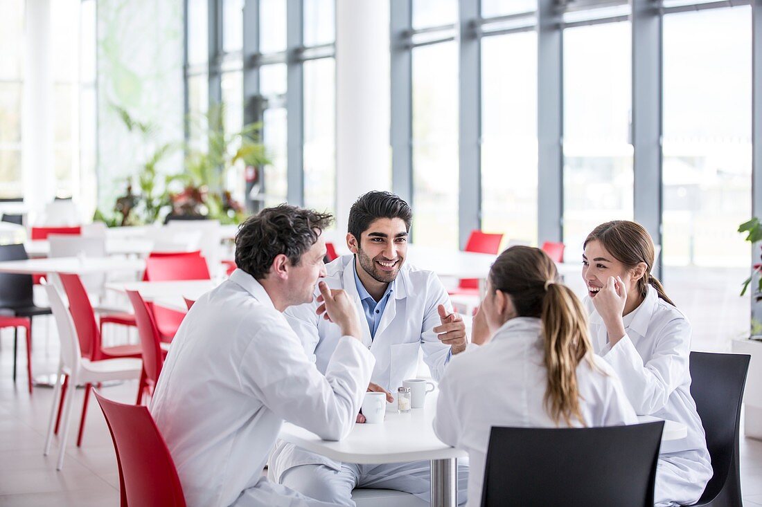 Medical colleagues in canteen relaxing