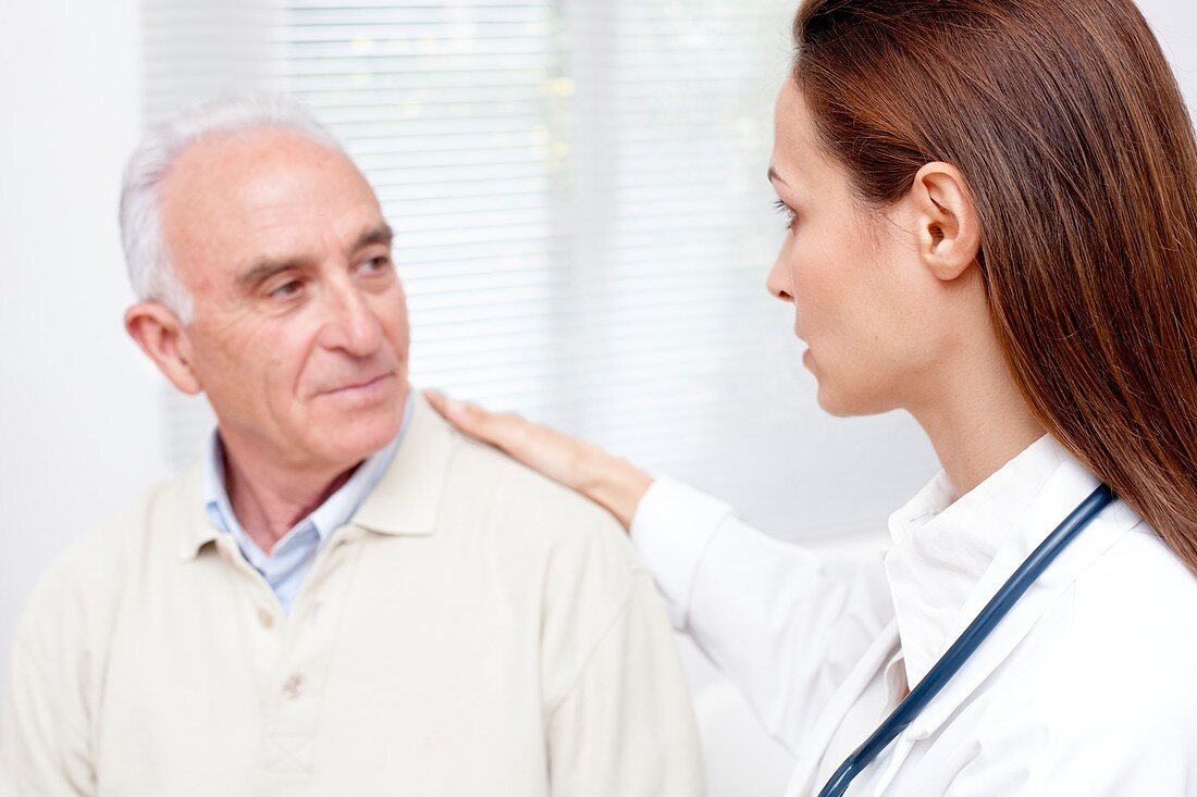 Doctor with senior male patient