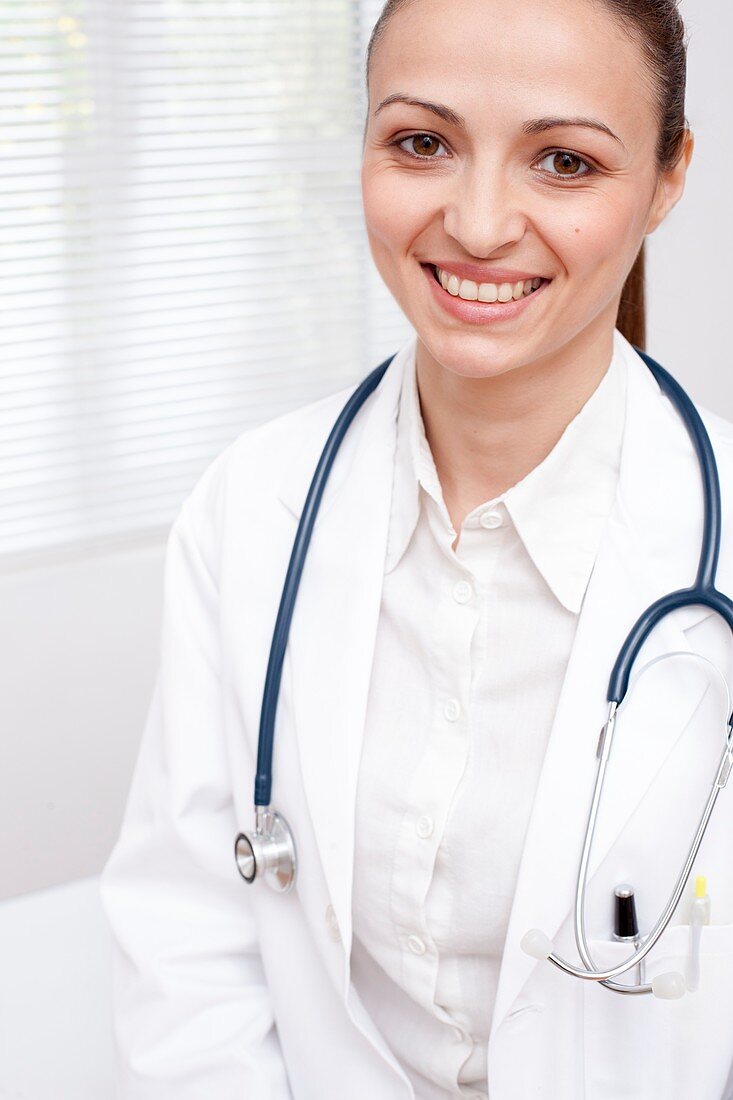 Doctor in uniform smiling