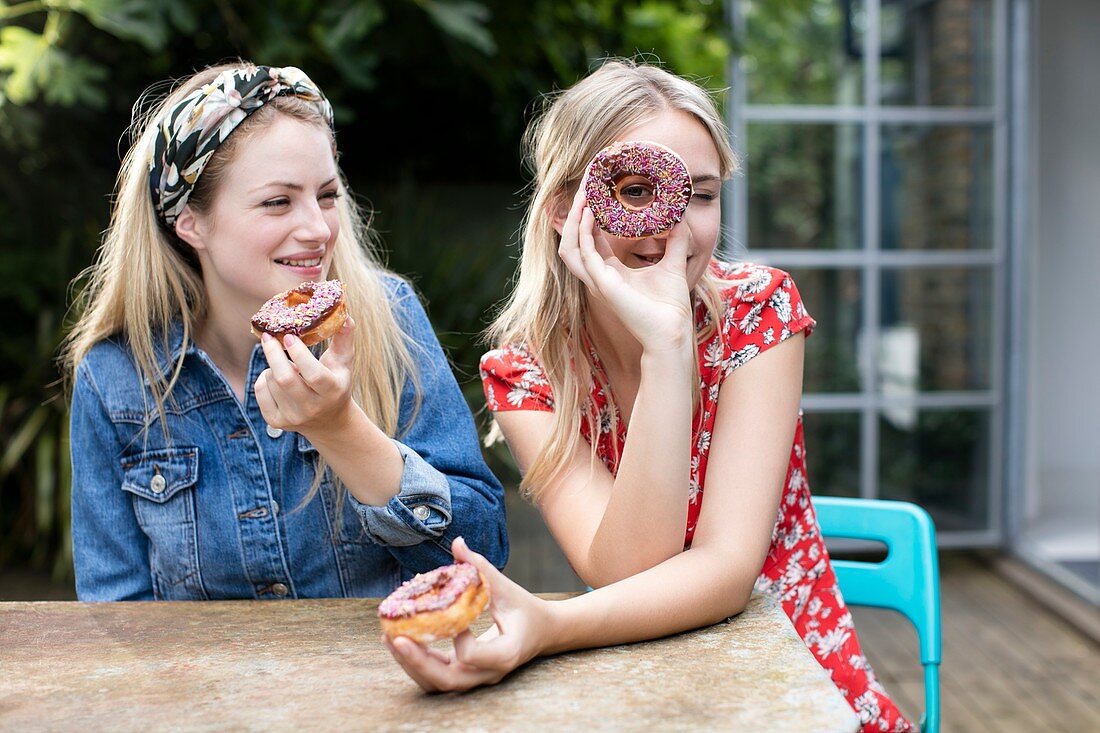 Women with doughnuts