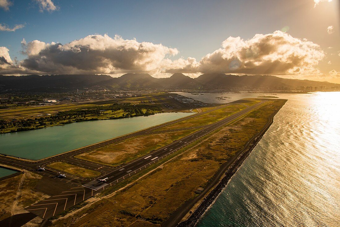 Coastal runway at sunrise, aerial photograph