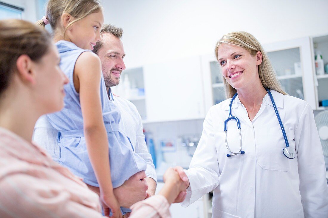 Doctor talking to family