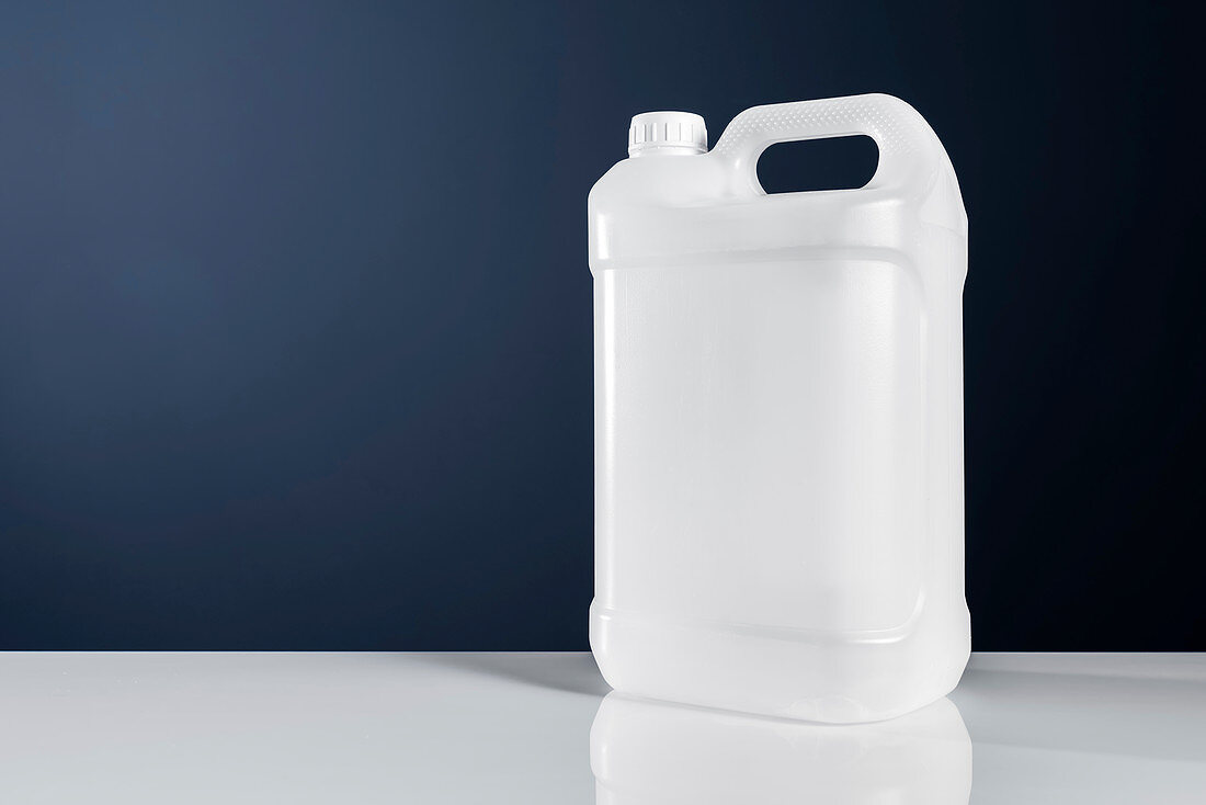 Unlabelled white plastic canister