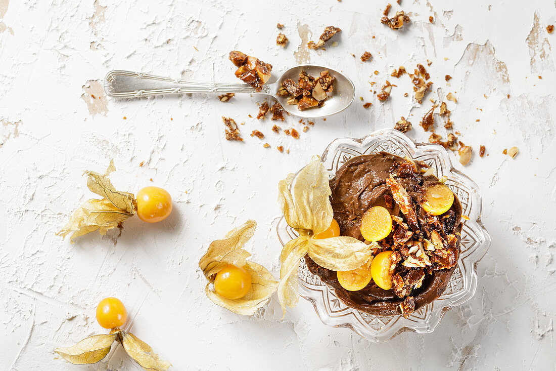 Low-carb avocado and chocolate mousse with physalis