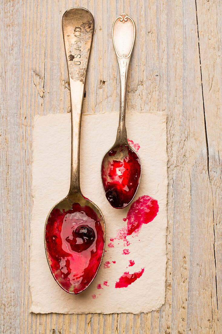 Berry jam on two spoons