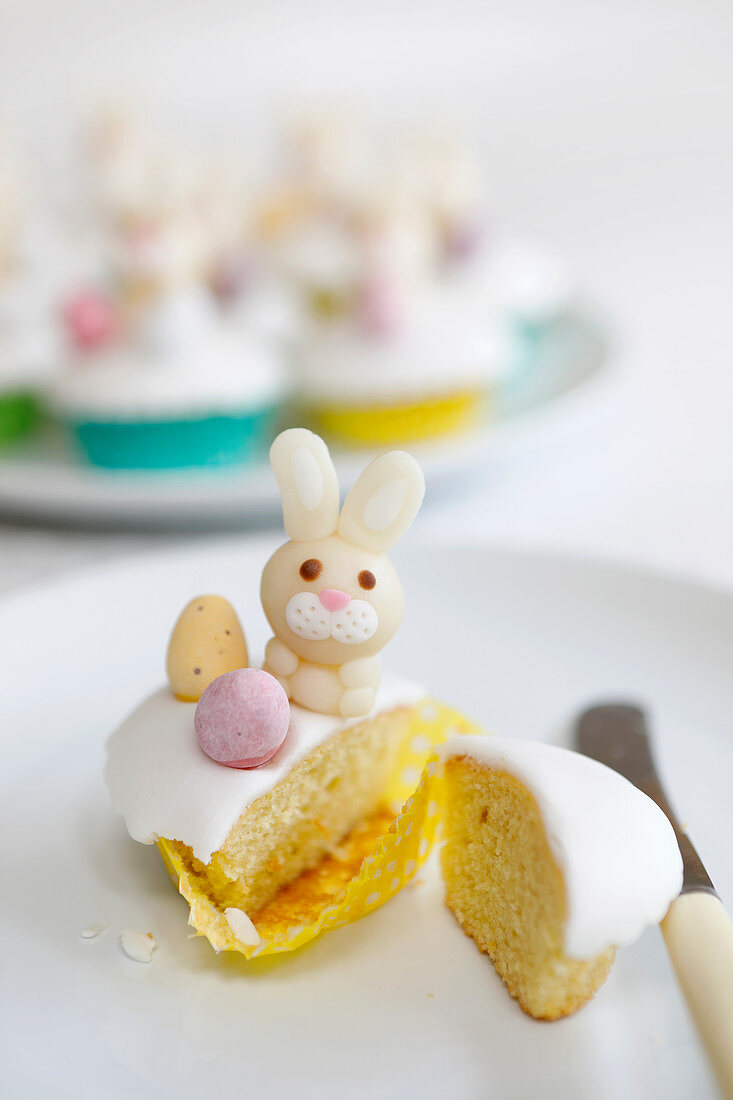 Easter cupcakes with marzipan bunnies and chocolate eggs
