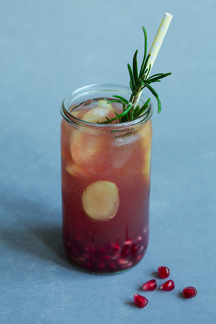 Pomegranate and lemon switchel with ginger and rosemary