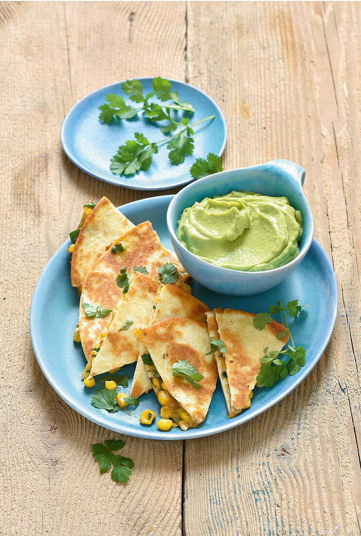 Corn and cheese quesadillas with avocado cream