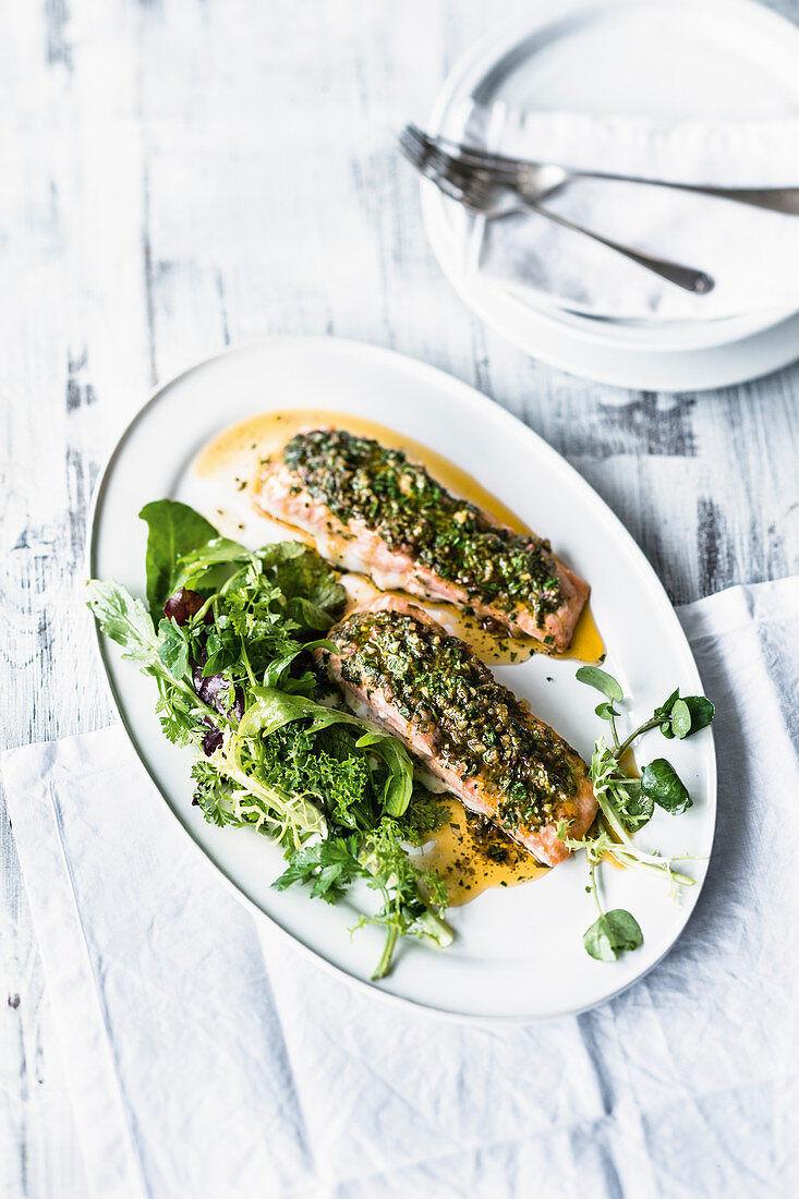 Spiced salmon with a wild herb salad