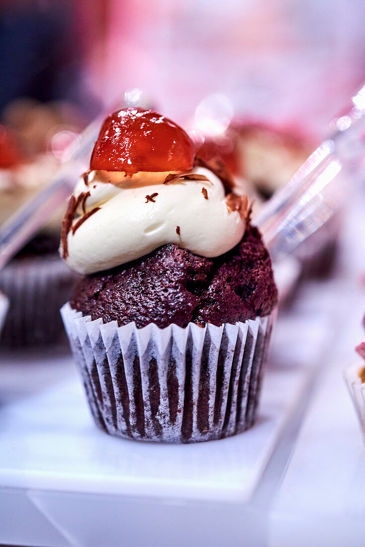 A black forest and cherry cupcake