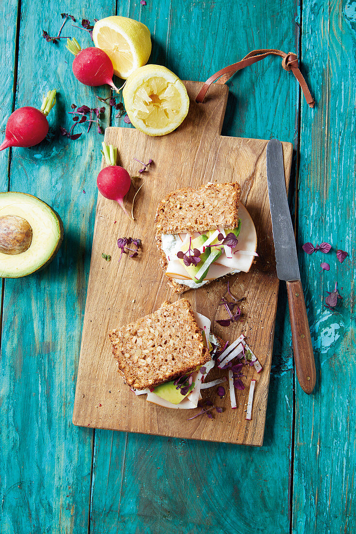 Turkey breast sandwich with quark, avocado and red cress