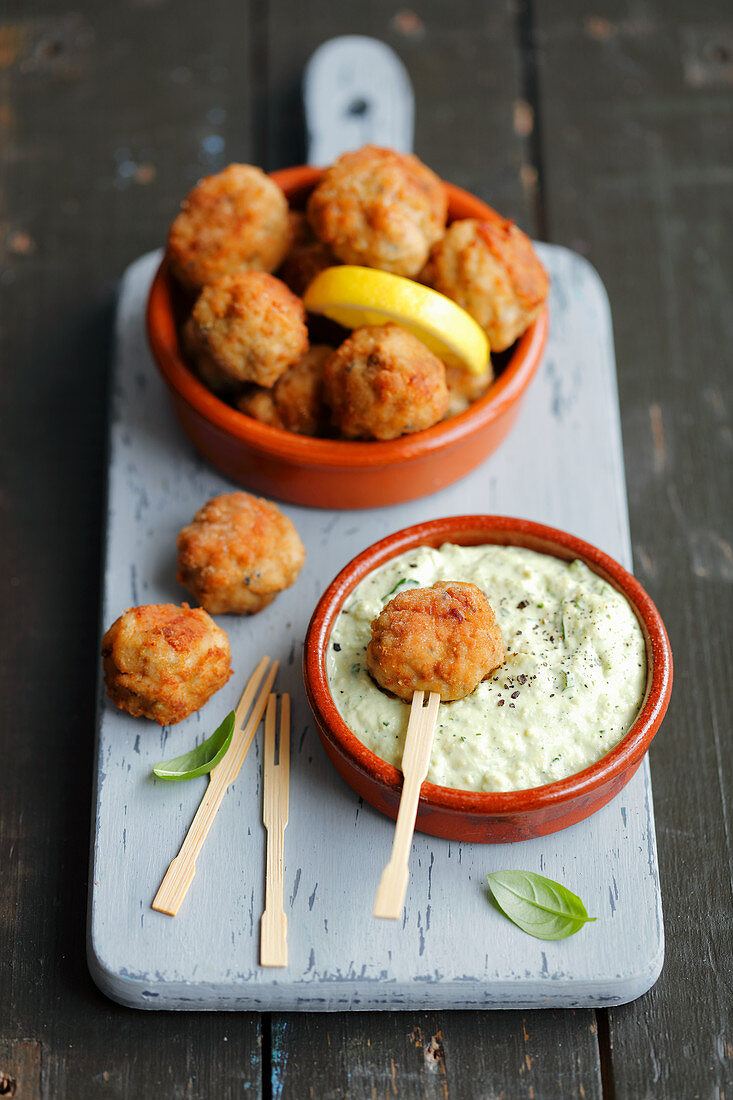Mini pork croquettes with avocado and mayo dip