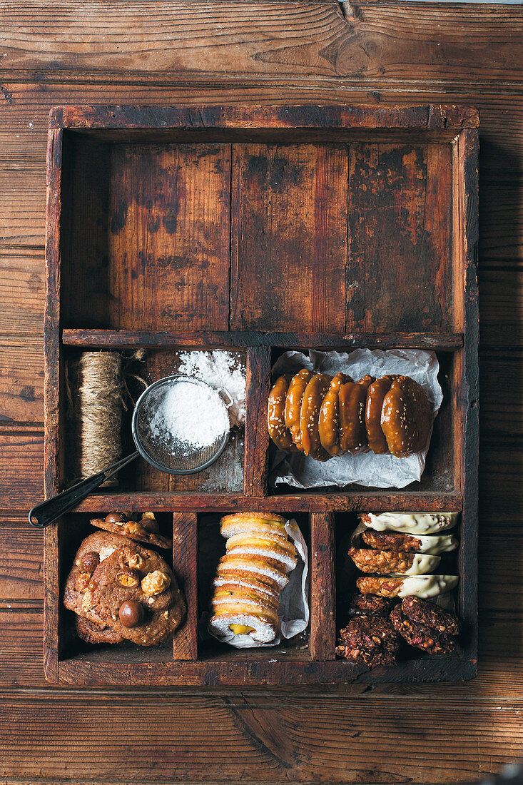 Various biscuits in a rustic wooden case