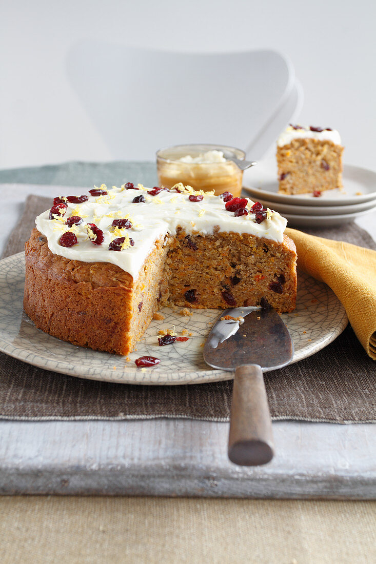 Pumpkin cake with cream cheese icing, sliced