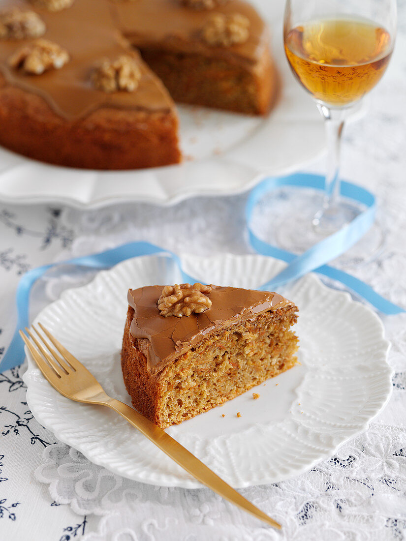 A slice of coffee and walnut cake