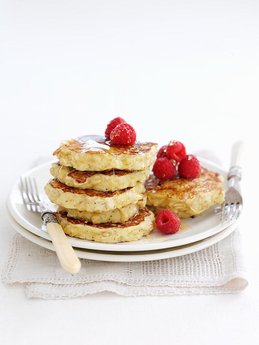 Healthy pancakes with raspberries and honey