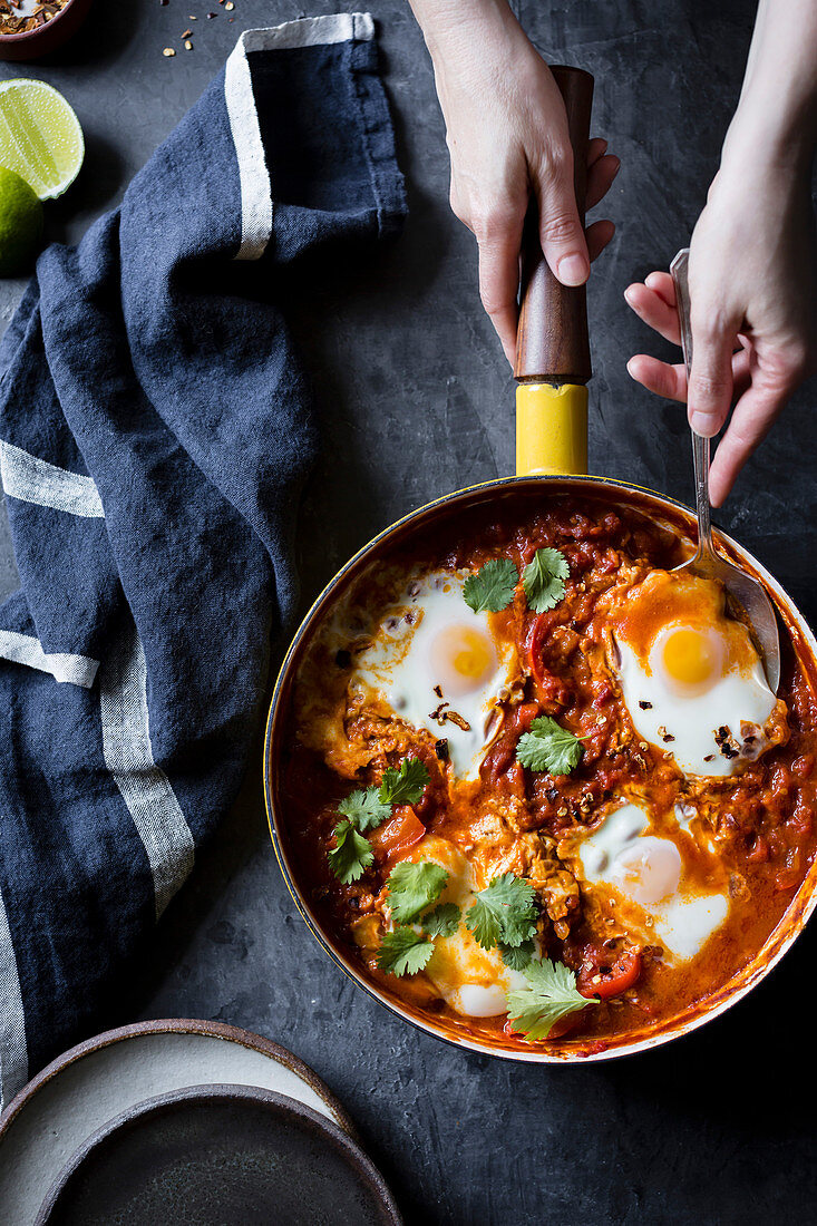 Shakshuka (baked eggs, North Africa) with coconut and curry