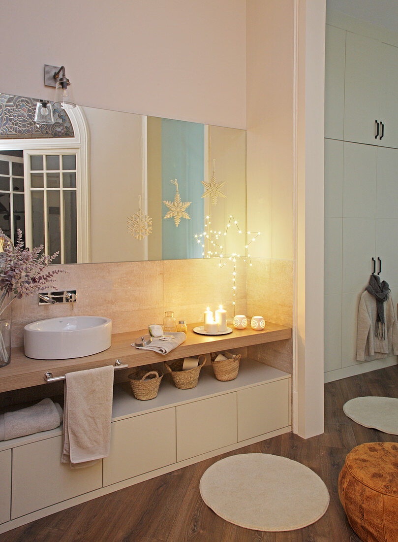 Long washstand with countertop sink in large bathroom