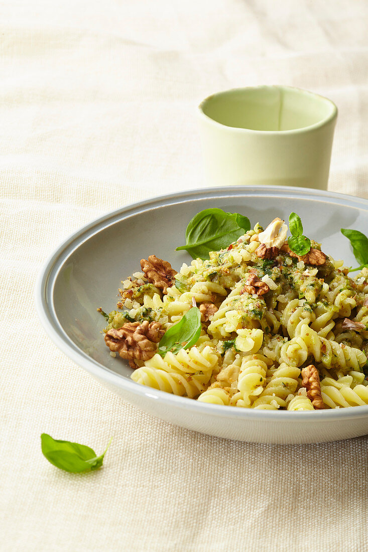 Fusilli with cheese and walnut sauce and basil