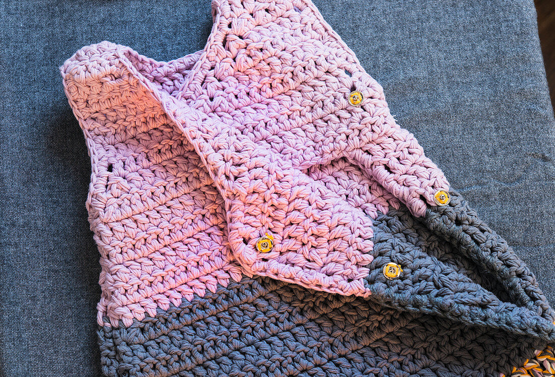 A crocheted baby sleeping bag