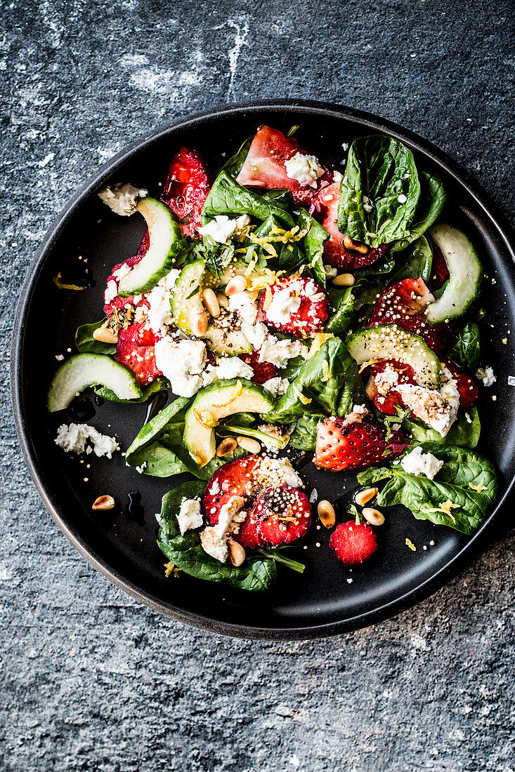 Strawberry salad with spinach and feta cheese