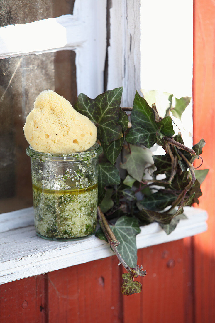 A homemade exfoliator made from leaves, olive oil and sea salt