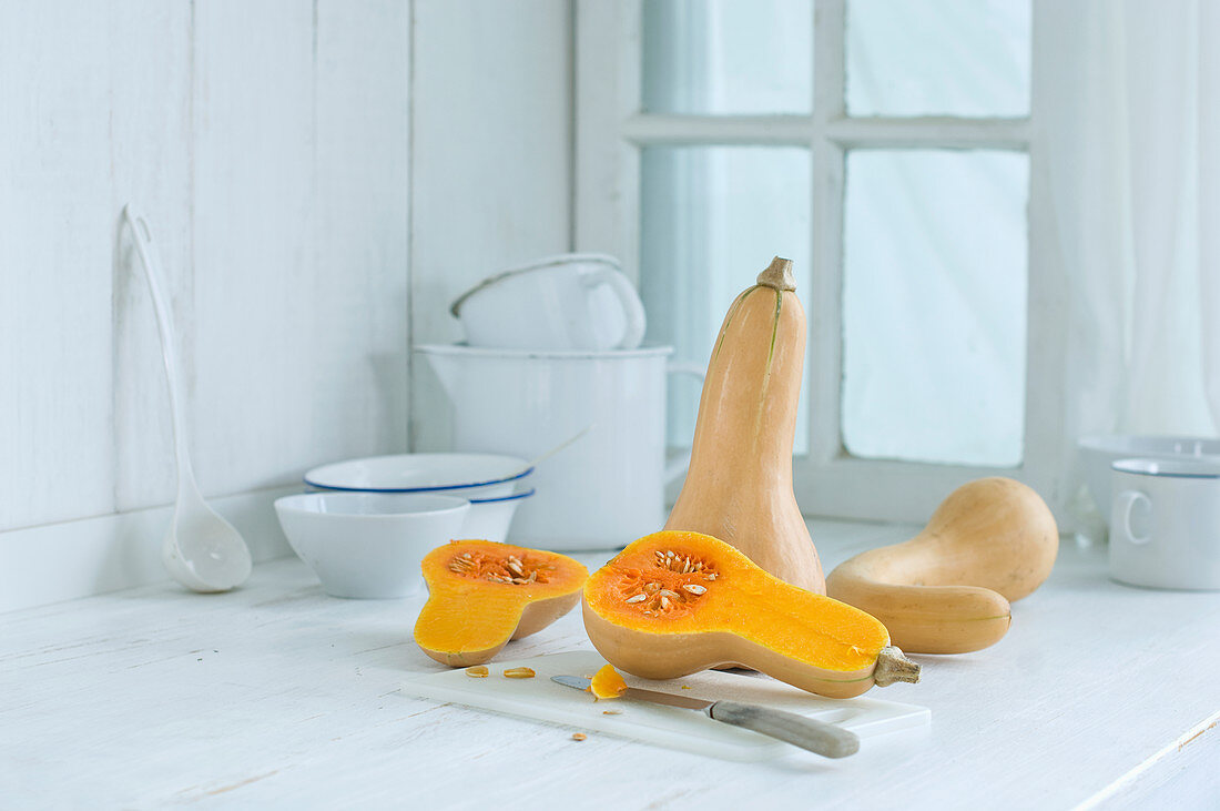Butternut squash on a rustic kitchen counter