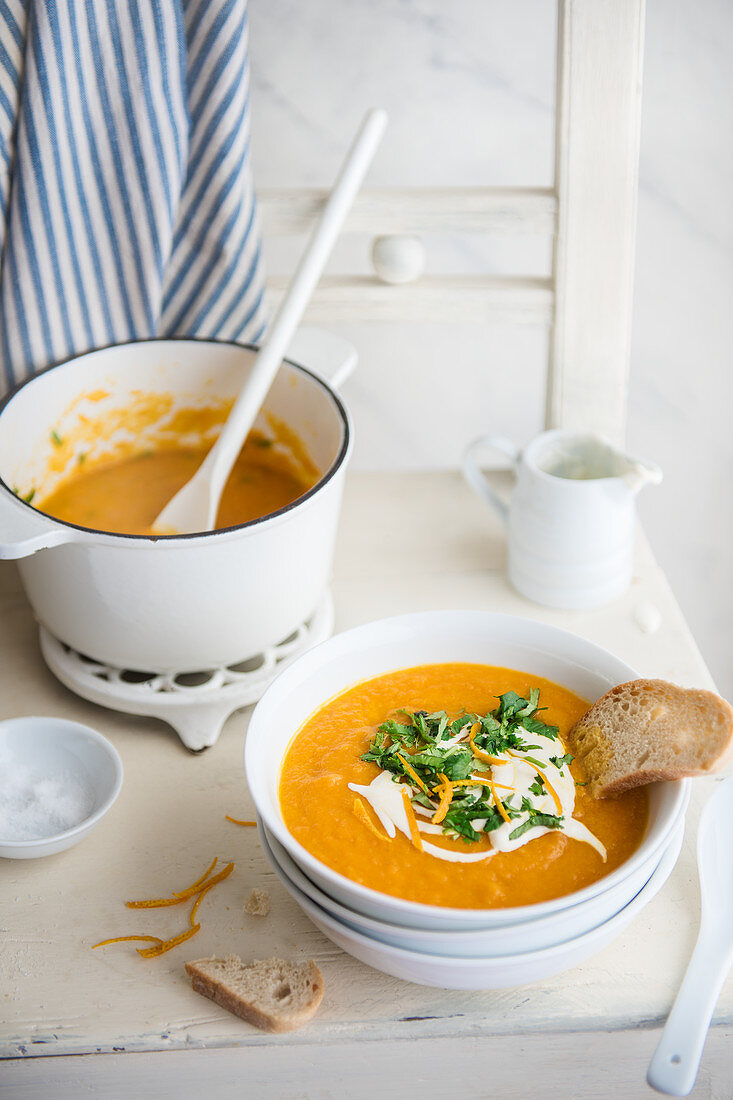 Carrot and orange soup with fresh coriander