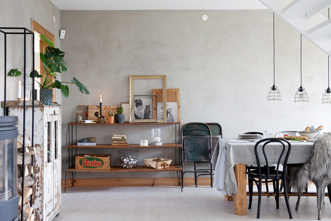 Vintage-style dining room in wintry shades with grey wall