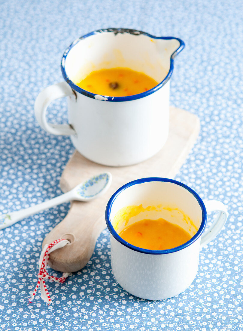 Pumpkin soup in an enamel cup