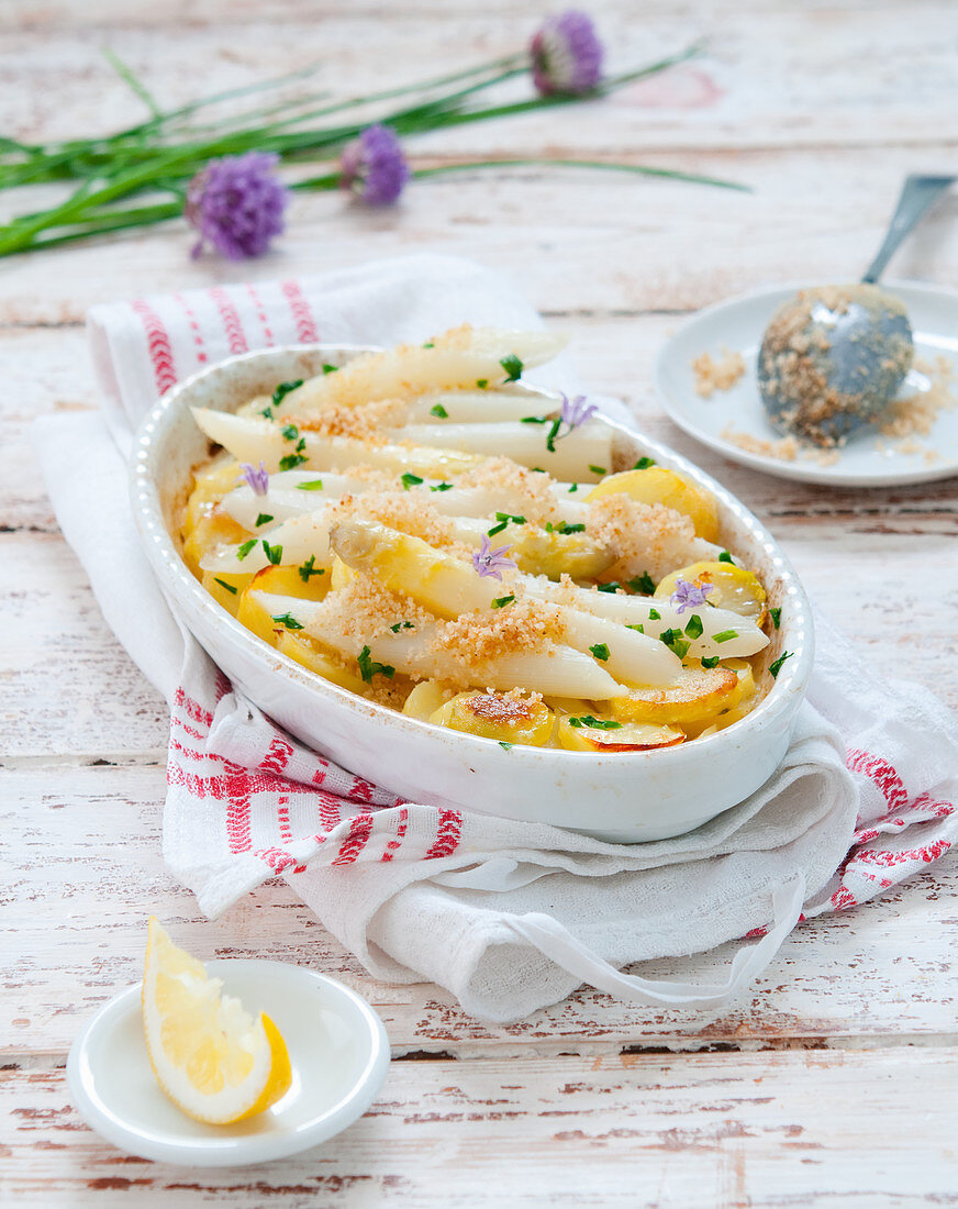 Asparagus and potato gratin with chive flowers