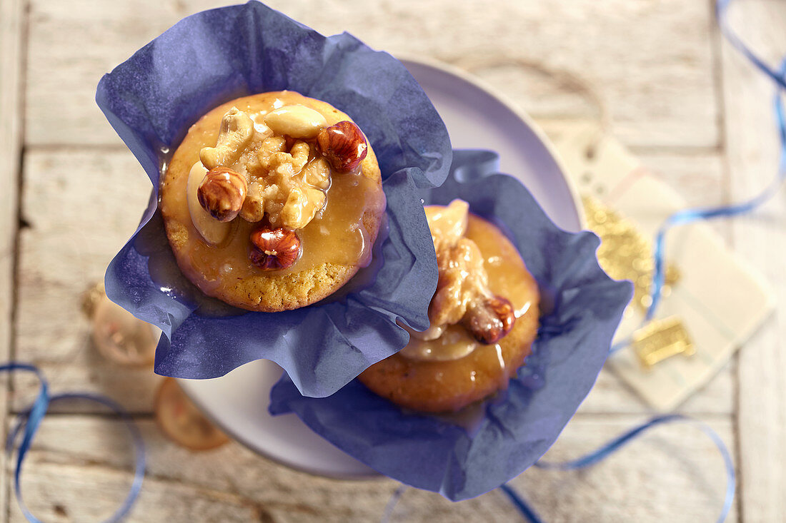 Toffee muffins in paper cases and on a cake stand