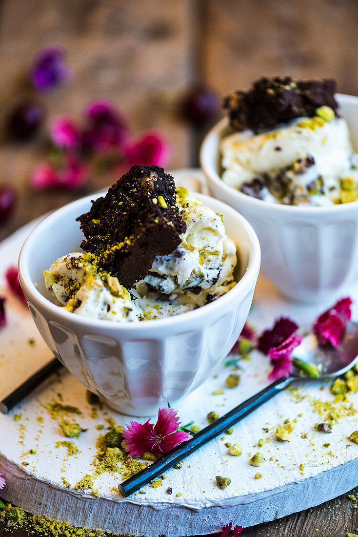 Brownie and pistachio ice cream in small bowls