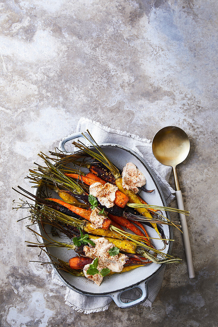 Roasted colourful carrots with cumin yoghurt sauce