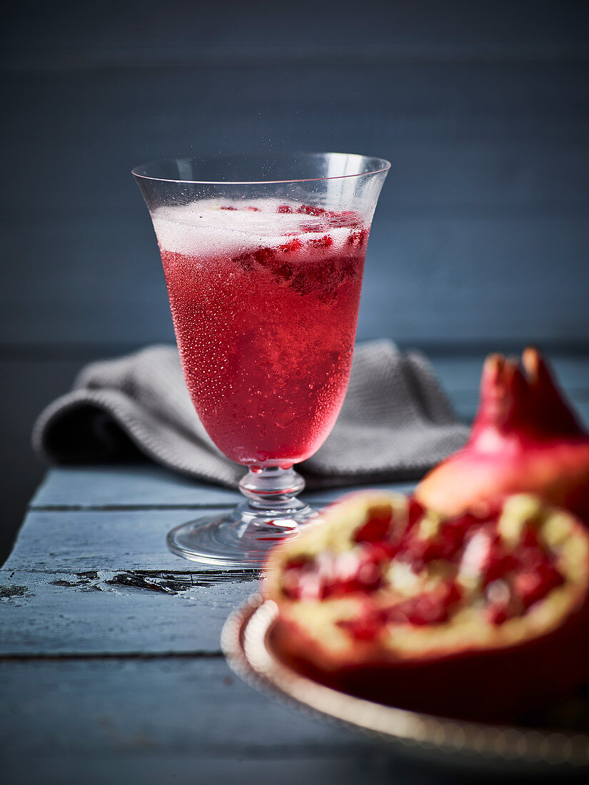 Cocktail made with pomegranate and sparkling wine