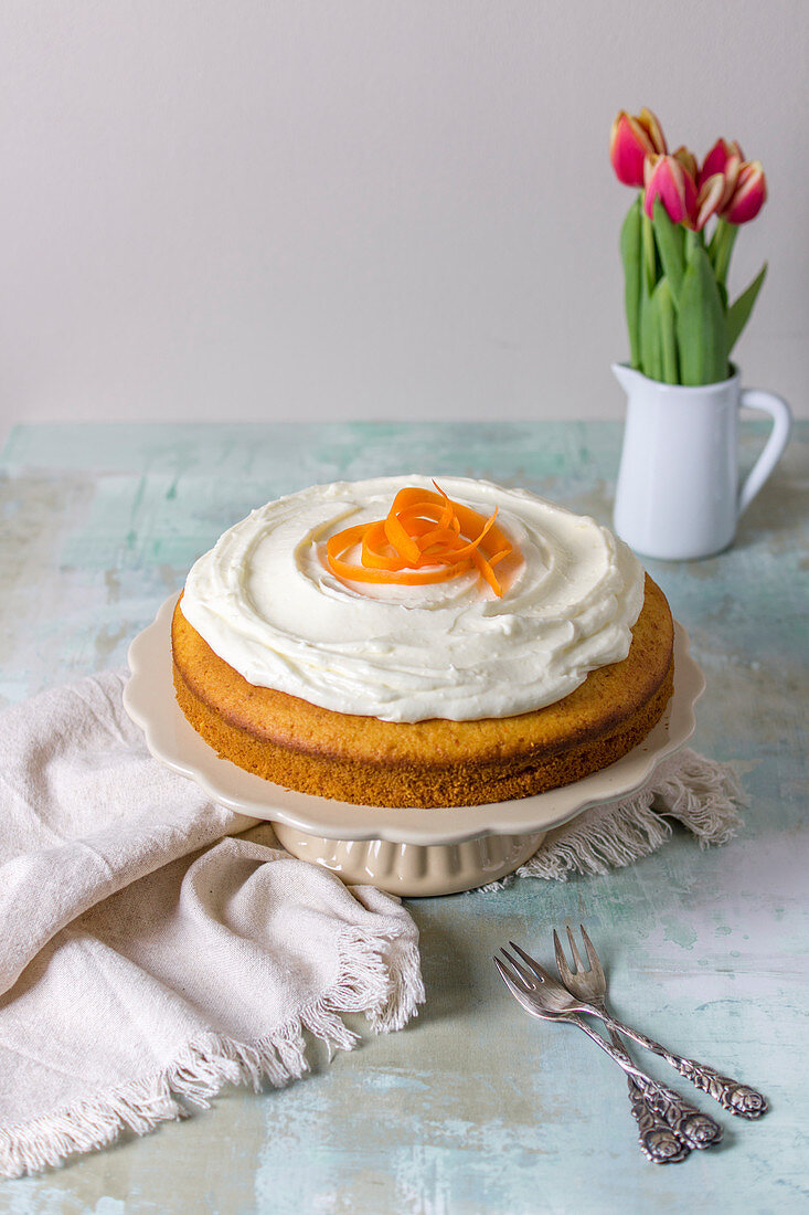 Carrot cake decorated with cream cheese