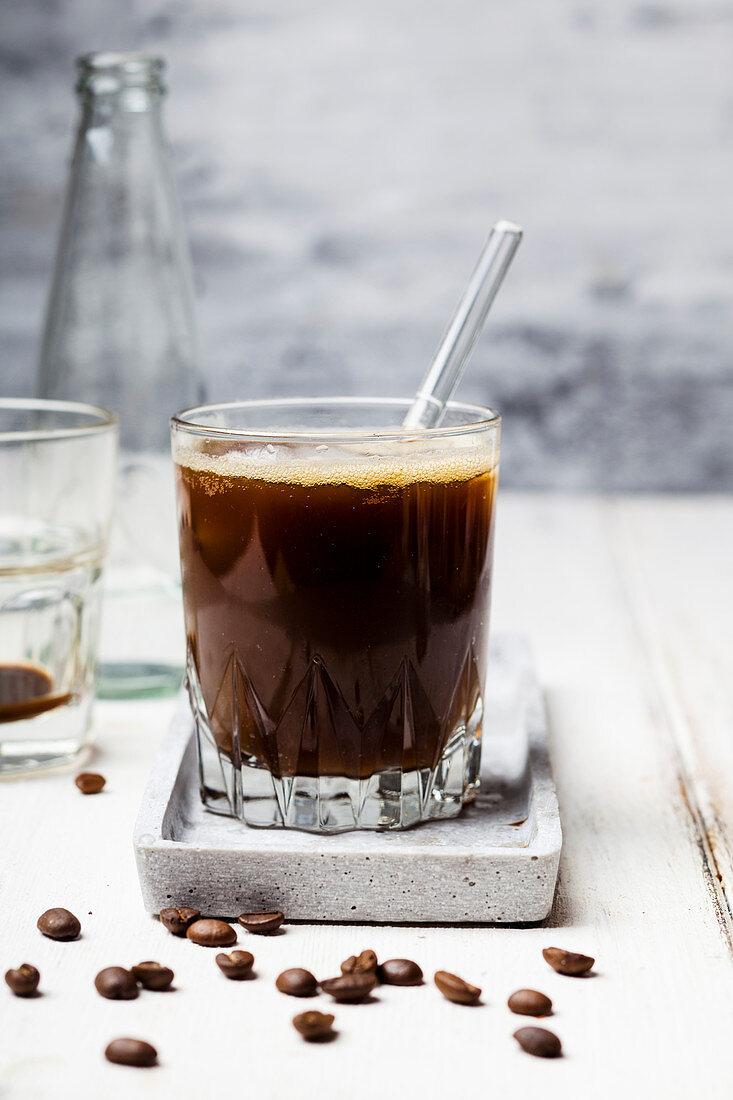 Espresso with sparkling water and ice cubes