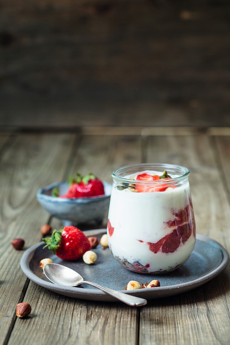 Greek yoghurt with strawberry and chia seed jam, and hazelnuts