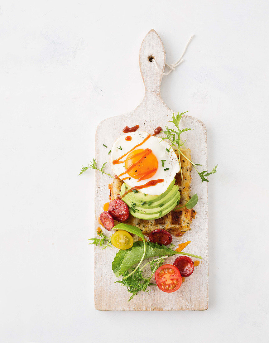 Savoury waffles with fried egg and avocado