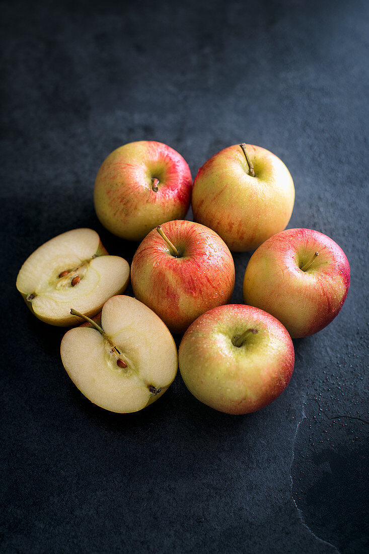 Apples on a dark slate