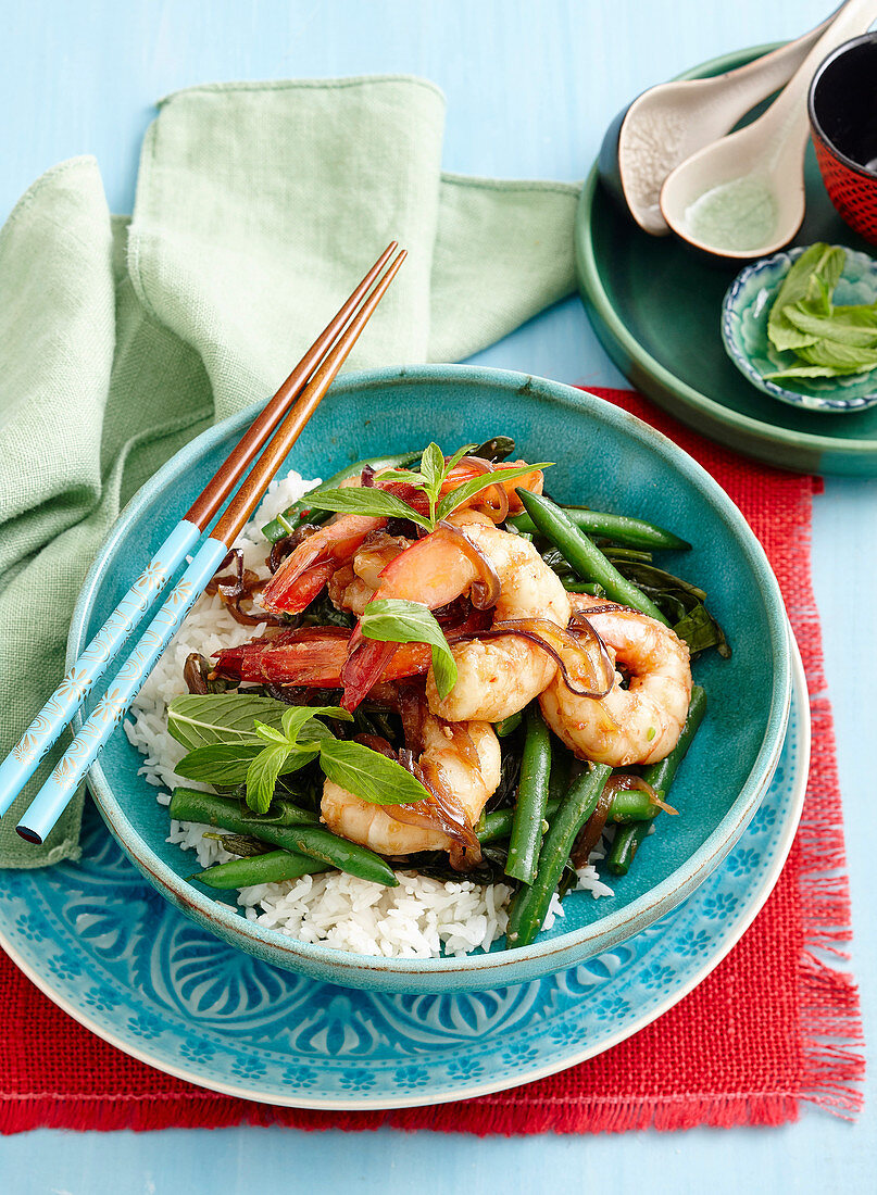 Hot and sweet prawns with stir-fried greens