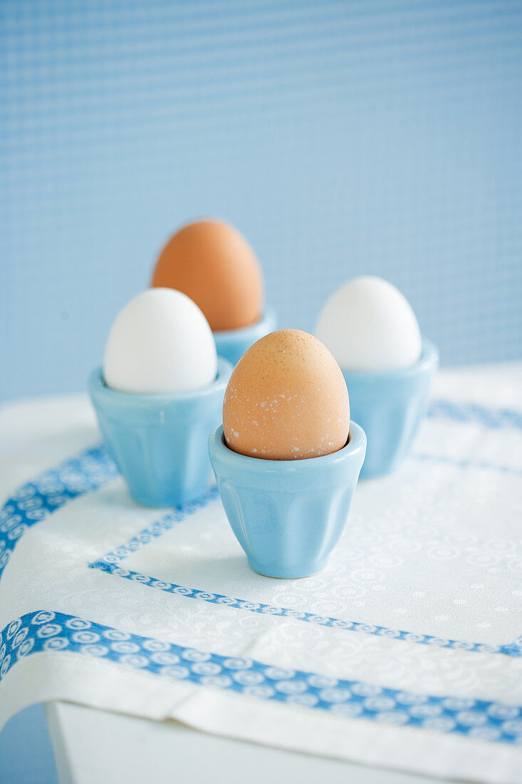 Four eggs in eggcups