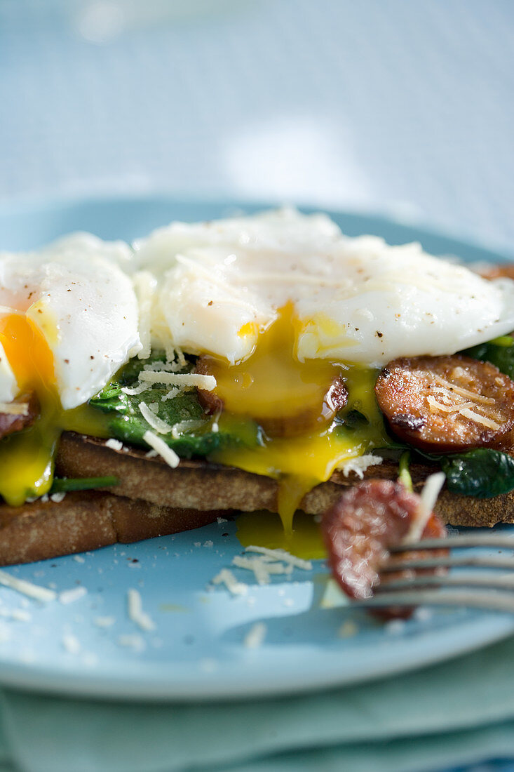 Poached eggs on toast with Spinach Sausage