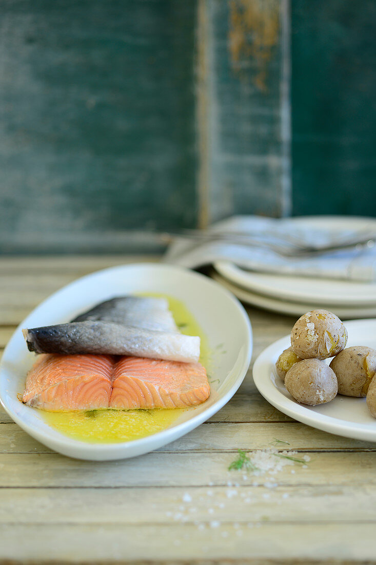 Fried salmon steak and papas arrugadas (potatoes with a salted crust)